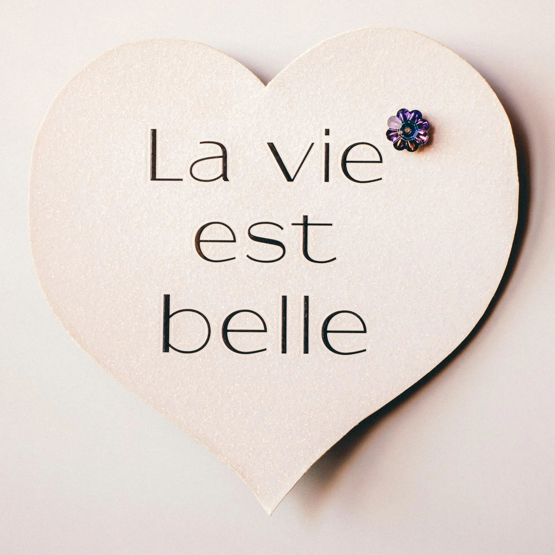 a white round object with black text